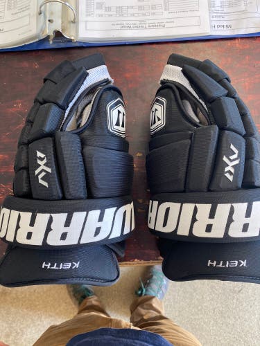 Duncan Keith Used Warrior 14" Pro Stock AX1 Pro Gloves