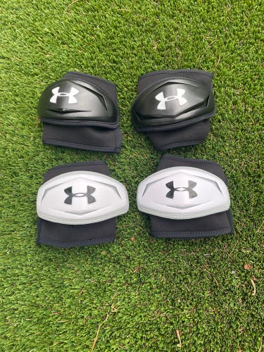 Black and White defensive elbow pad caps
