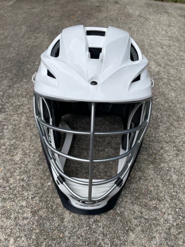 Used white cascade lacrosse helmet