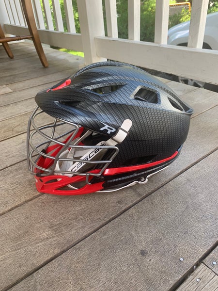 New Cascade R Carbon Fiber Lacrosse Helmet with chrome face mask and red chin. Perfect Condition