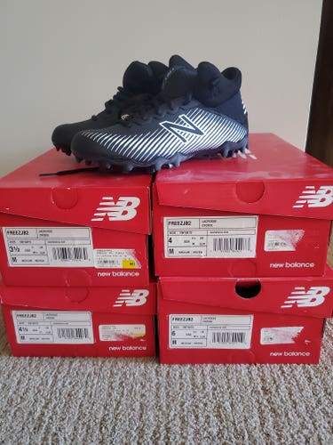 New Balance Freeze kids cleats - Size 4