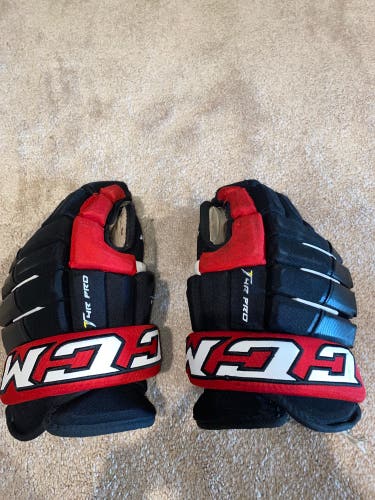 Used CCM 14" Tacks 4 Roll Pro Gloves