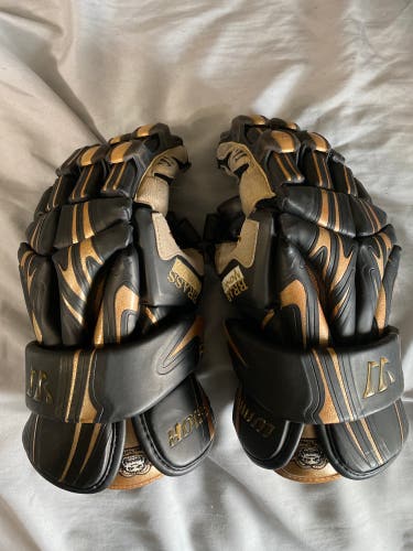Used Player's Warrior 13" Brass Monkey Lacrosse Gloves