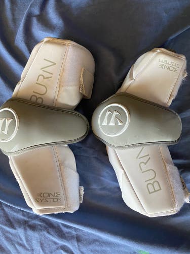 Used Medium Warrior Burn Arm Pads