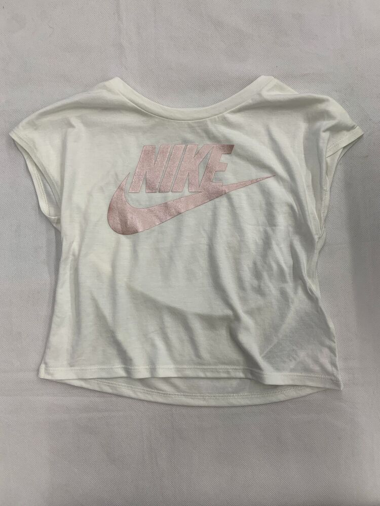 pastel pink nike shirt