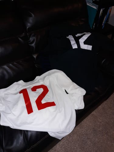 Set of Black and White Medium Jerseys
