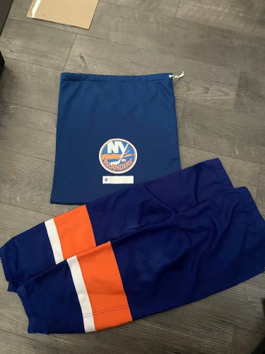 NY ISLANDERS GAME USED SOCKS AND HELEMT BAG