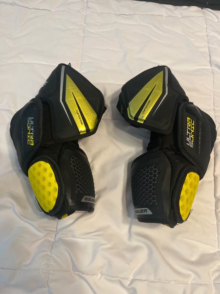 Used like new Medium Bauer Supreme Ultrasonic Elbow Pads