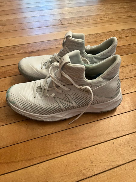 White Mens size 11 (Womens 12) New Balance Freeze