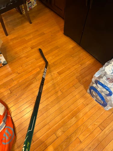 Bauer vapor adv dressed as green hyperlite 70 flex caufield curve