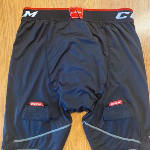 Black New XXL CCM, base layer short with velcro sock attachment.