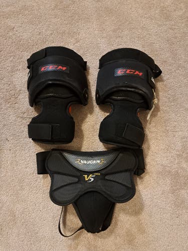 Used CCM knee pads and Vaughn Cup