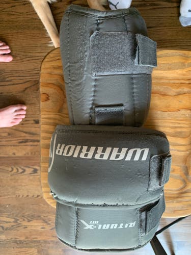 Used Warrior INT Goalie Knee Pads 12 to 15 Years old