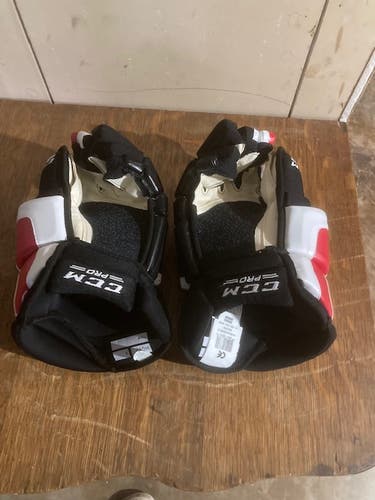 Used one game  15” CCM HG40 Pro Stock Red/Black/White