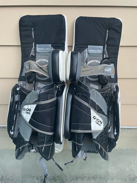 Used 31" Warrior Ritual G4 Goalie Leg Pads