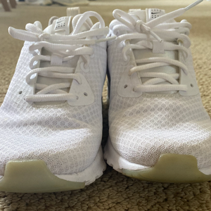 All White Nike Tanjun Sneakers