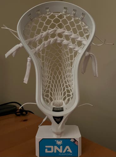 Strung ECD DNA lacrosse head