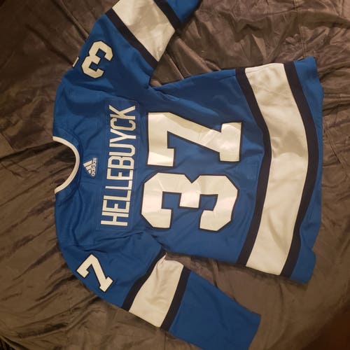 Connor Hellebuyck Jets Alternate Jersey Medium