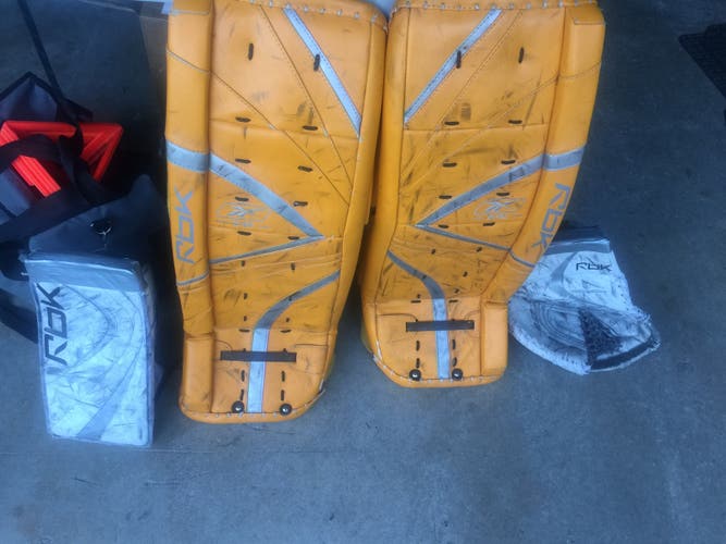 Used 33" Reebok 7k Yellow Pads and 6k Sr Blocker/ Catcher