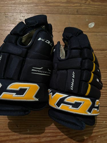 Used CCM 13" Tacks 4 Roll Pro Gloves