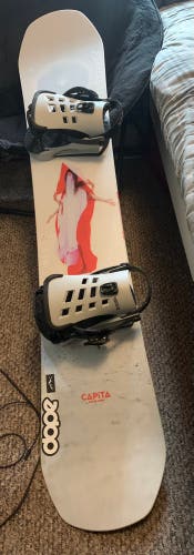 Used  CAPiTA Without Bindings Medium Flex True Twin Super DOA Snowboard