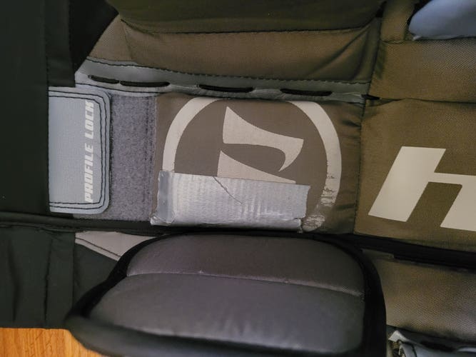 Used 31" Warrior Ritual G4 Goalie Leg Pads