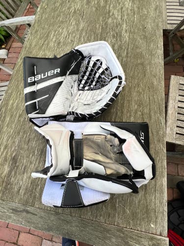 Used Bauer Regular Supreme 3s Blocker and Glove.