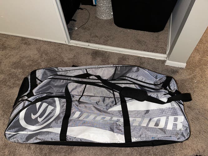Used Warrior Lacrosse Bag With Stick And Cleat Pockets