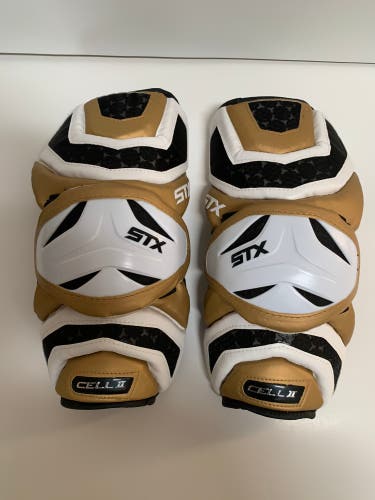 New STX Cell II Arm Guards Gold Large