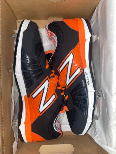 New balance 12.5 metal cleats new in box