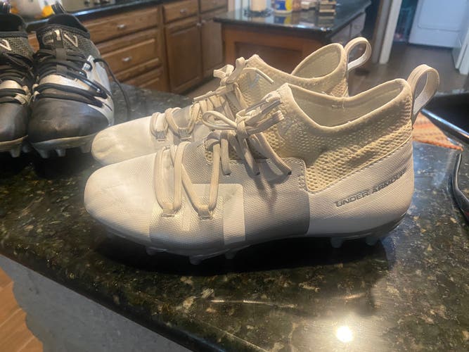 Pair Of Youth Under Armour C1N football cleats