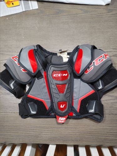 Used Junior Medium CCM U +12 Shoulder Pads