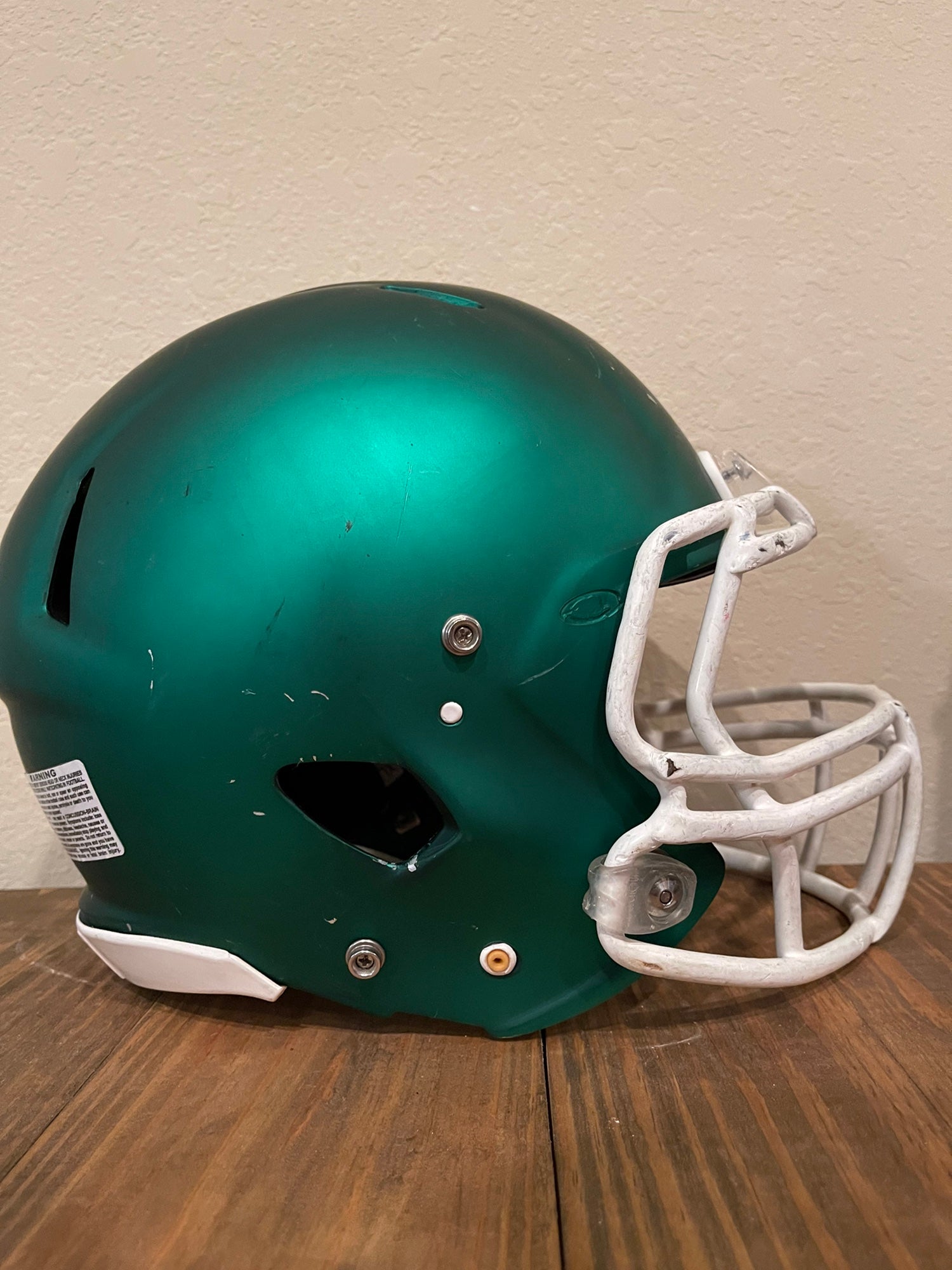 matte green football helmet