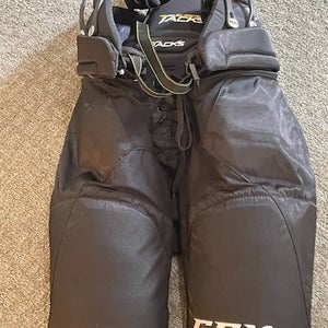 Barely used like new condition Junior Used Large CCM Super Tacks Hockey Pants great