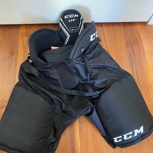 $15.00 - Junior Used Large CCM LTP Hockey Pants