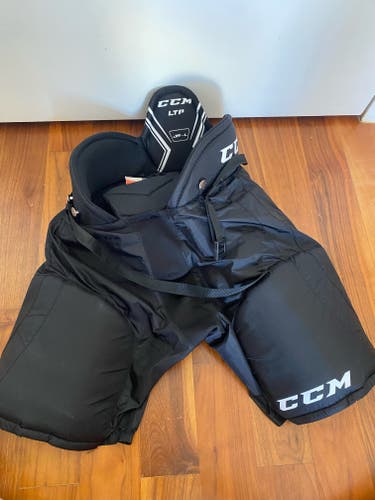 $15.00 - Junior Used Large CCM LTP Hockey Pants