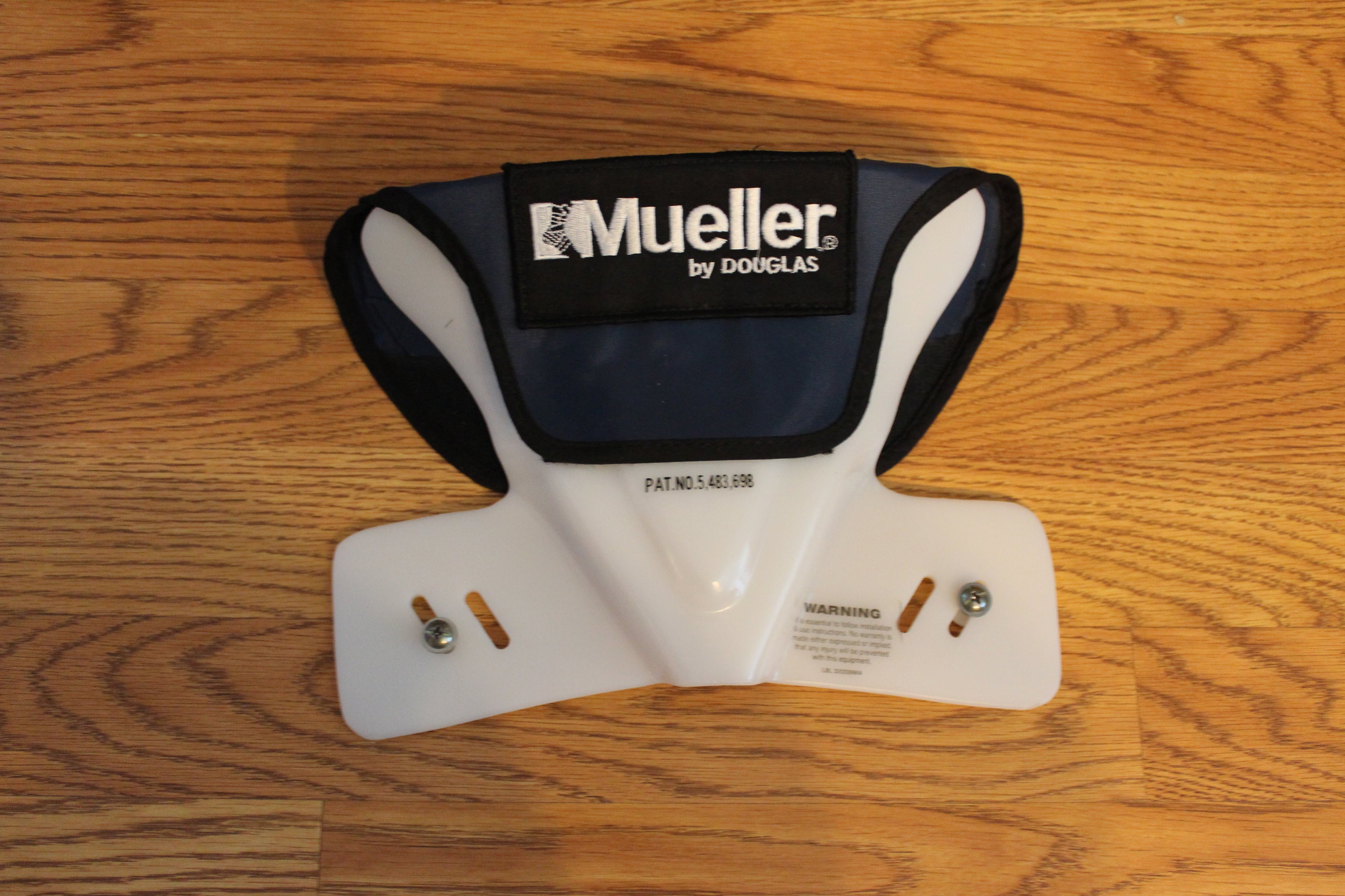Brand New Mueller by Douglas Butterfly Neck Restrictor Navy Blue