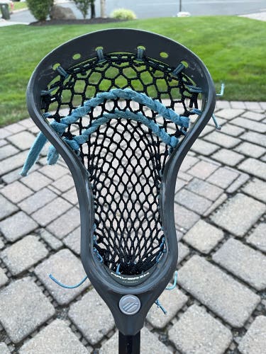 Used Grey Maverik Tactik head with black ECD mesh and Carolina shooters on True shaft