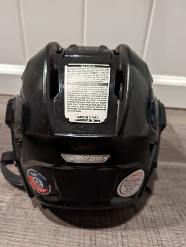 Used Adult Small Bauer Re-Akt 200 Helmet