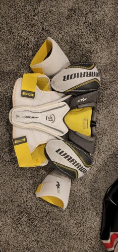 New Intermediate Small/Medium Warrior Dynasty AX3 Shoulder Pads and 1 pr of Used Gloves 12"