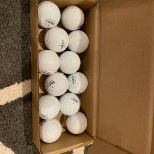 12 NEW Wilson Golf Balls