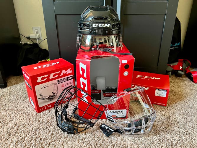 Used Medium CCM Tacks 910 Helmet w/ Visor, Cage And Clear Shield