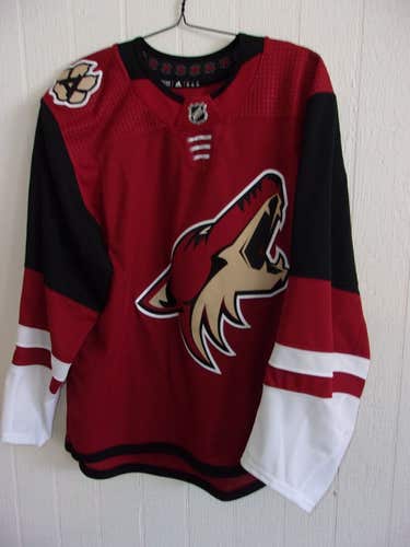 Arizona Coyotes unused/unnumbered red home Adidas game jersey from 2015-2022 (size 56)