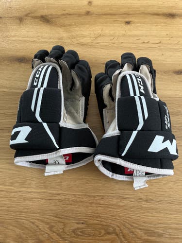 Used CCM Tacks 4R2 Gloves 13"