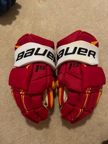 LIGHTLY USED Bauer Supreme 1S 15” Pro Stock Calgary Flames Gloves