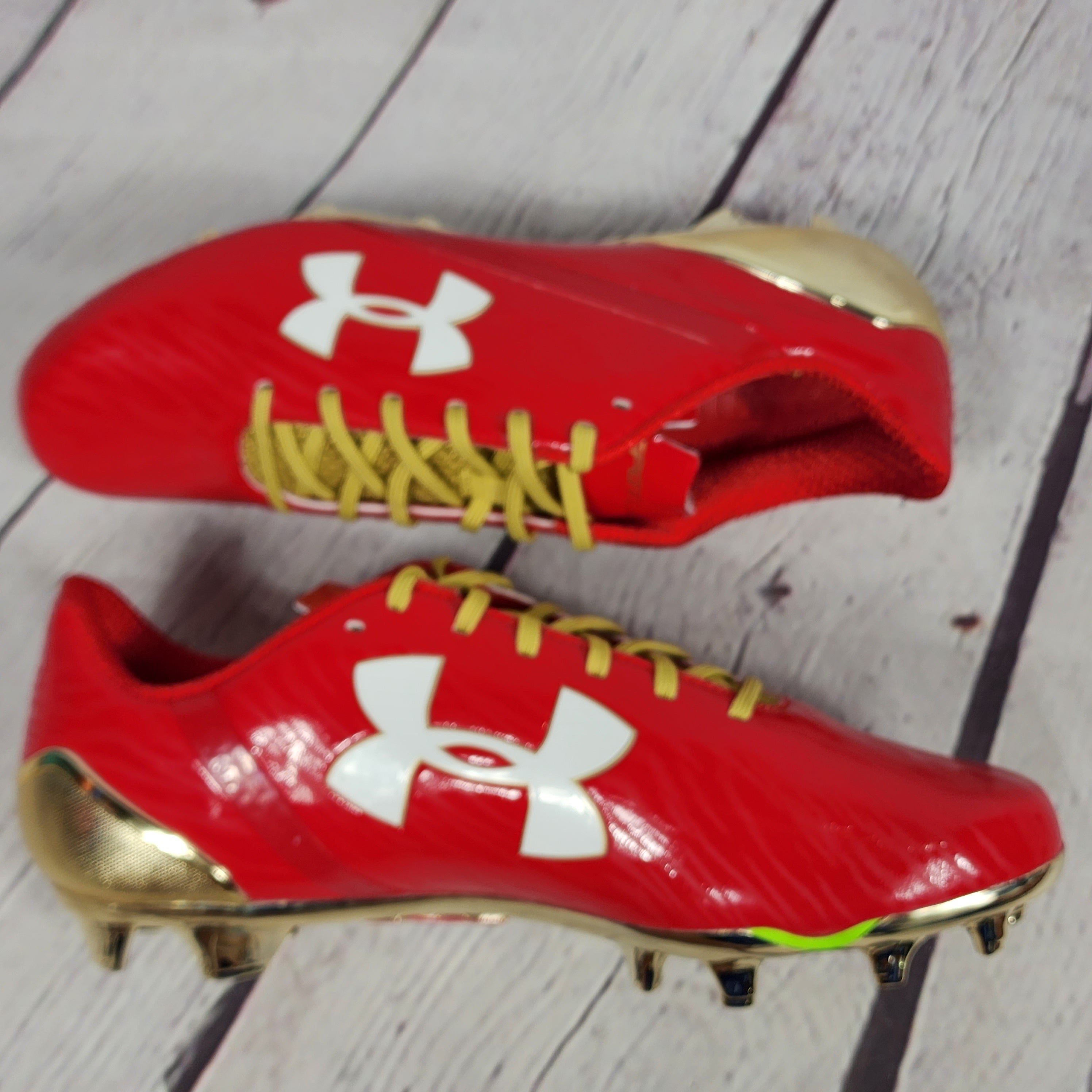 Under Armour Men's Size 11.5 Red Gold Spotlight LE Football Cleats