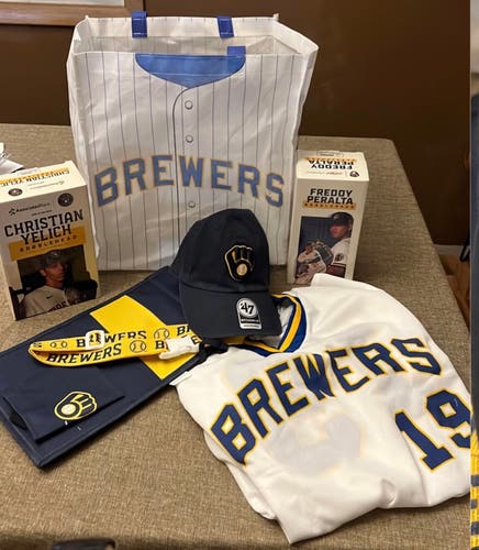 Christian Yelich + Freddy Peralta bobble head Milwaukee Brewers bag jersey hat