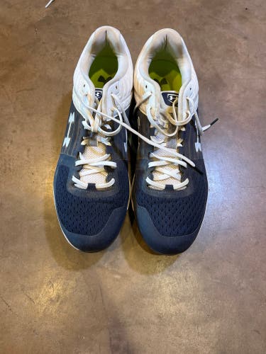 2x Under Amour Cleat, 1x Nike Cleat