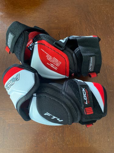 New Medium CCM FT4 Pro Elbow Pads