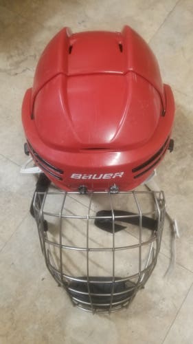 Used Large Bauer Re-Akt 75 Helmet with size large cage